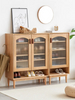 Living room entry doorway oak wood shoes storage cabinets with glass door